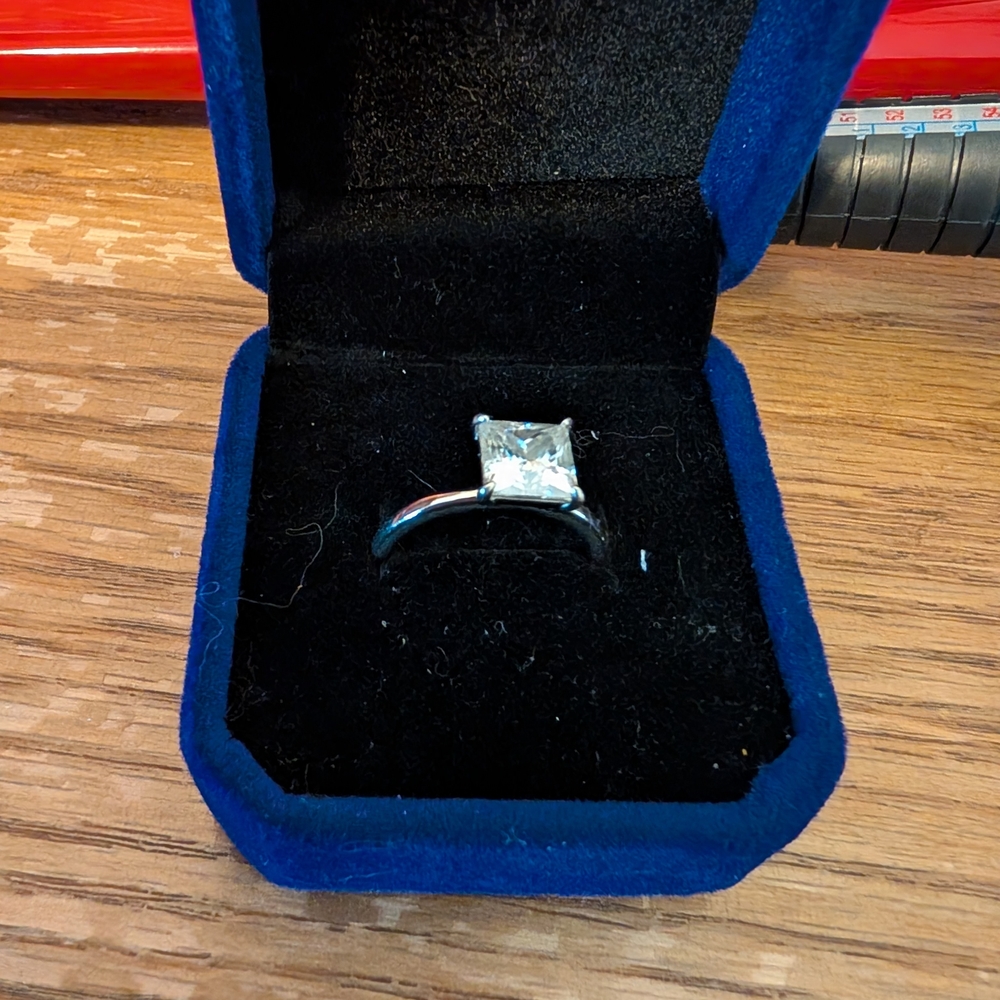 Silver and White Solitaire Ring with Princess Cut Diamond
